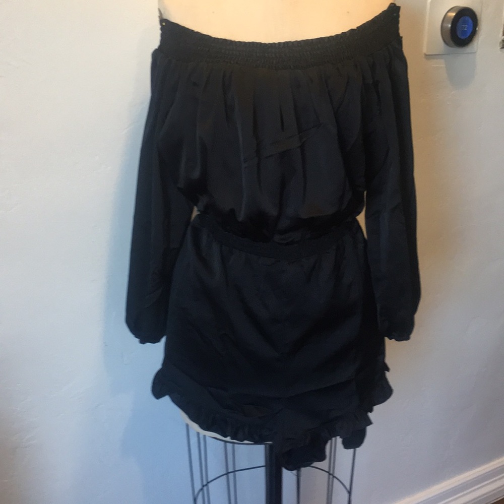 NWT Bebe black romper